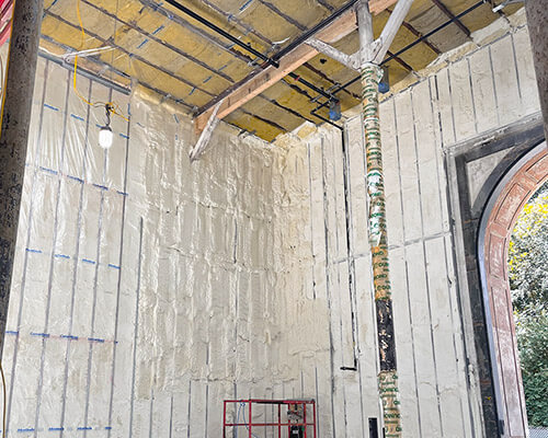 Open cell spray foam applied on external wall